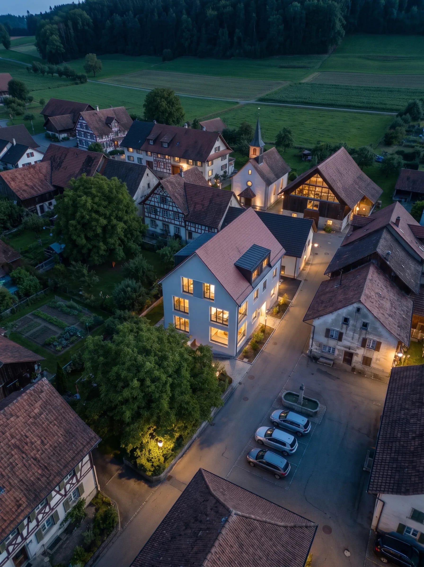 il villaggio di notte con finestre illuminate